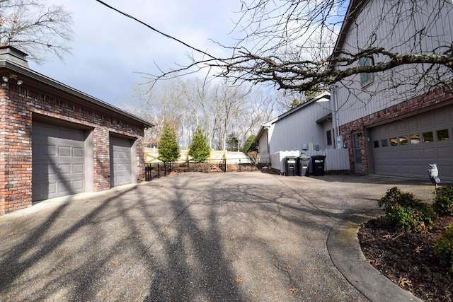 view of home's exterior with a garage