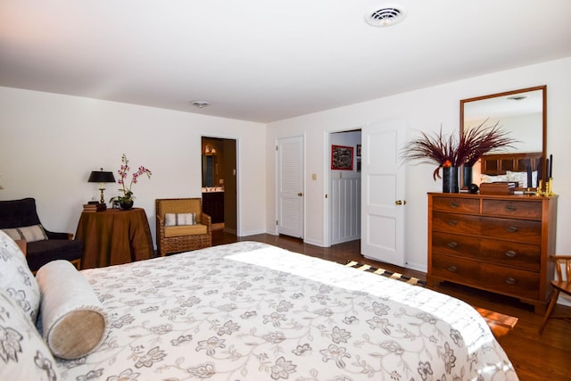 bedroom featuring dark wood-type flooring