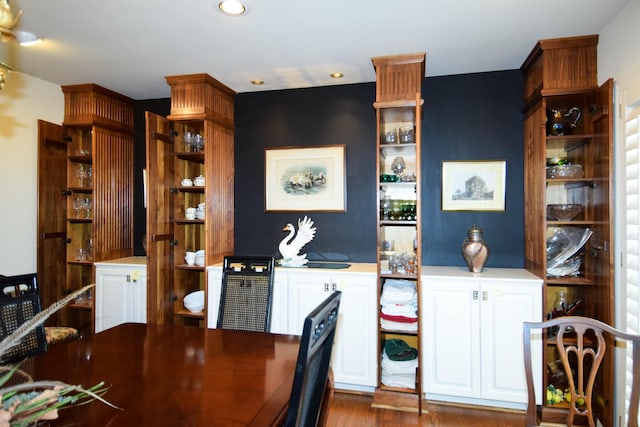 dining area featuring dark hardwood / wood-style flooring