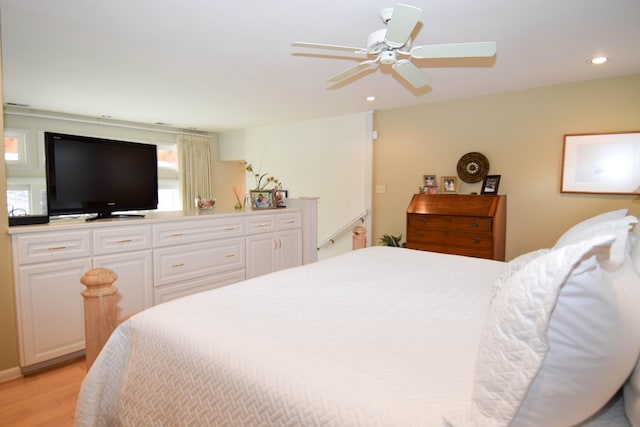 bedroom featuring ceiling fan and light wood-type flooring