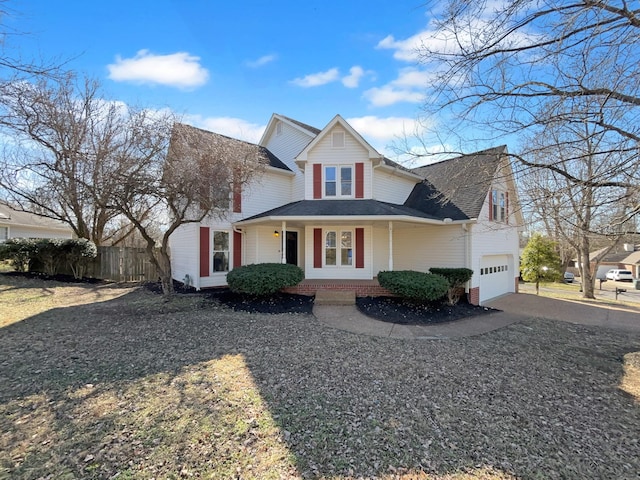 view of front of home featuring a garage and a porch