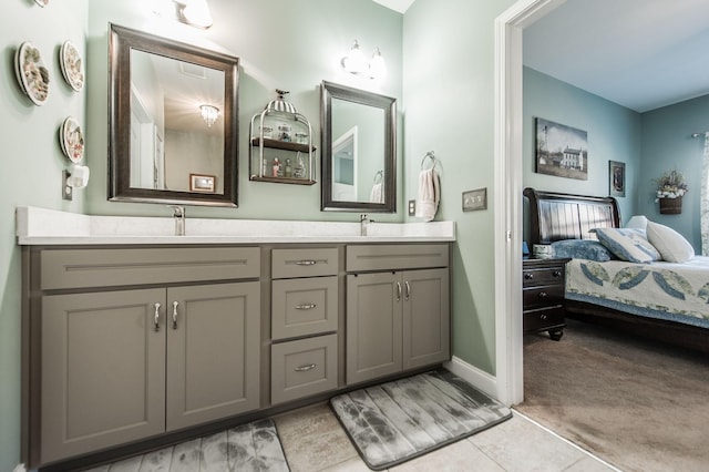 bathroom featuring tile patterned floors and vanity