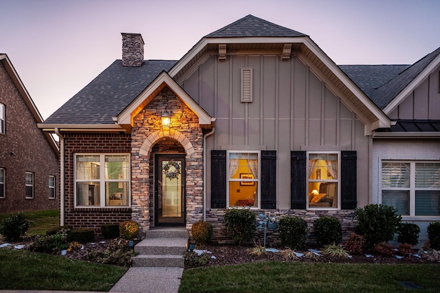 view of front of home with a yard