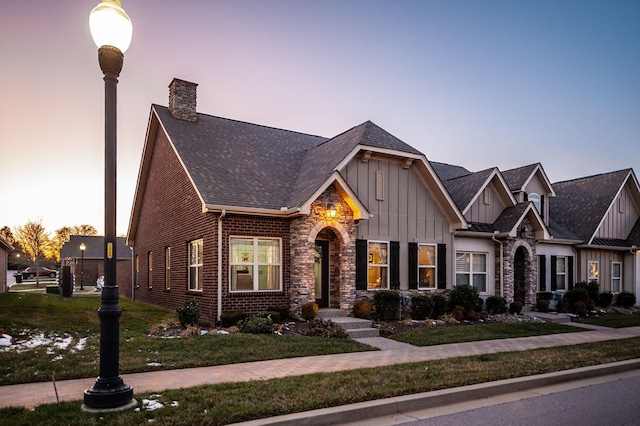 view of front of property with a yard