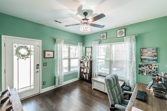 office space featuring ceiling fan and dark hardwood / wood-style floors