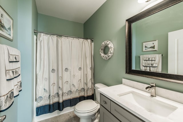 full bathroom with vanity, toilet, and shower / tub combo