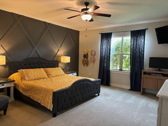 bedroom with crown molding, light colored carpet, and ceiling fan