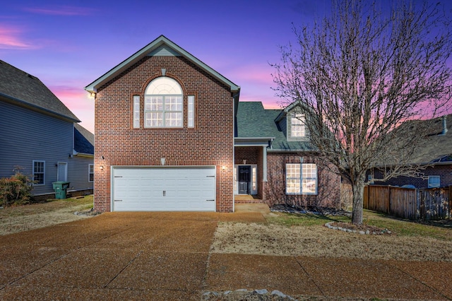 front of property featuring a garage