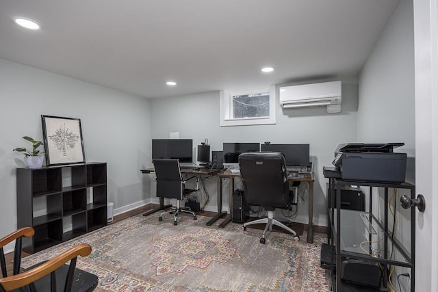 office featuring wood-type flooring and an AC wall unit