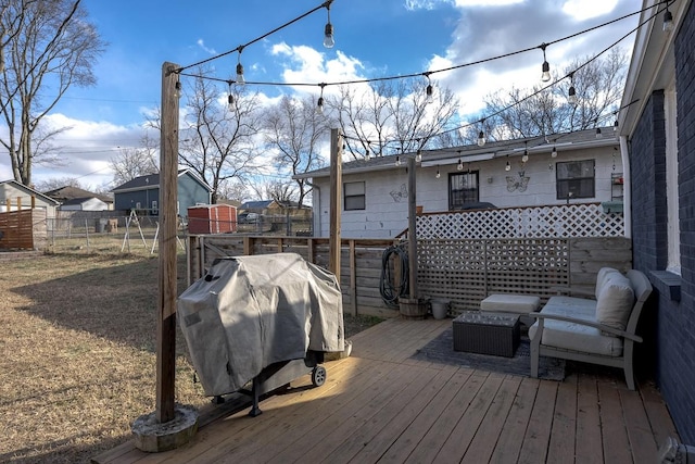 wooden deck featuring grilling area