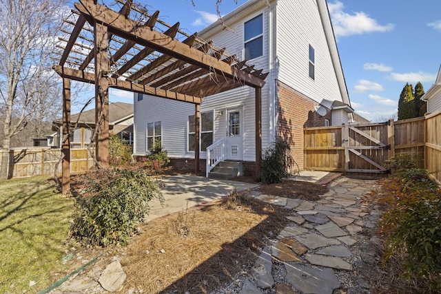 exterior space with a pergola and a patio area