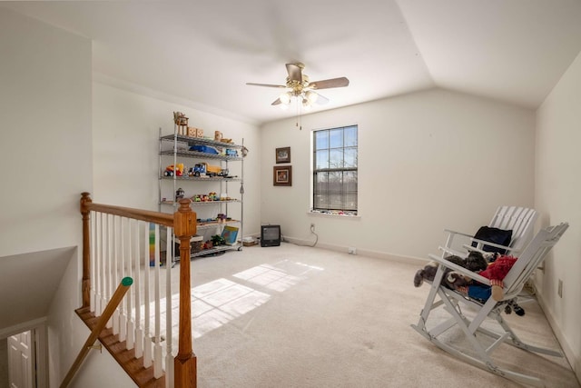 miscellaneous room featuring lofted ceiling, light colored carpet, and ceiling fan