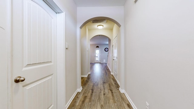 hall featuring hardwood / wood-style flooring