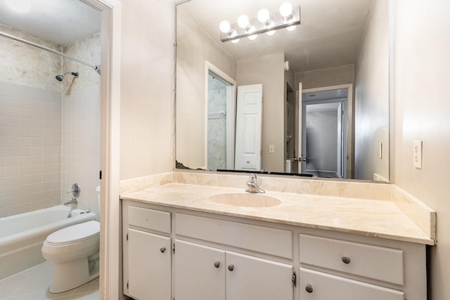 full bathroom featuring vanity, toilet, and tiled shower / bath combo