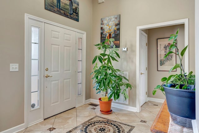 foyer with light tile patterned floors