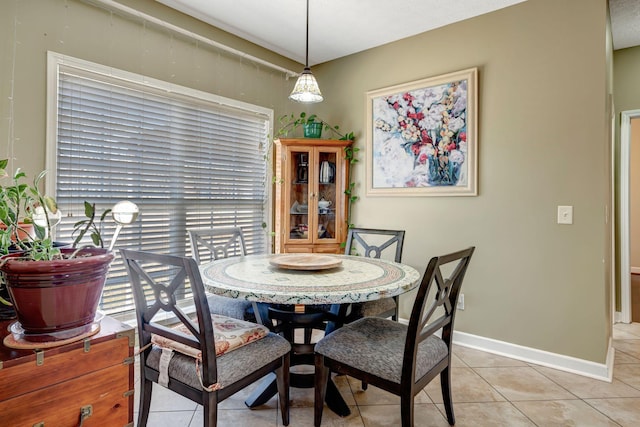 view of tiled dining space