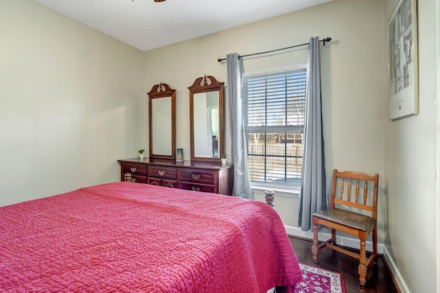 bedroom featuring dark hardwood / wood-style floors