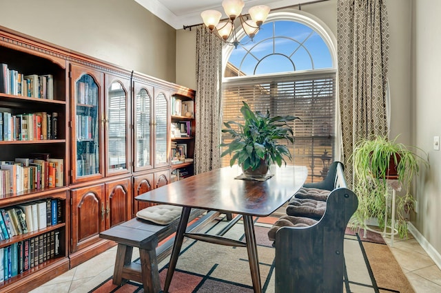 dining area featuring an inviting chandelier, light tile patterned floors, a wealth of natural light, and ornamental molding