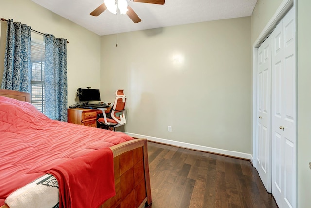 bedroom featuring ceiling fan, dark hardwood / wood-style flooring, and a closet