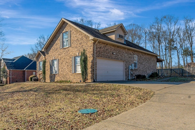 view of home's exterior with a garage