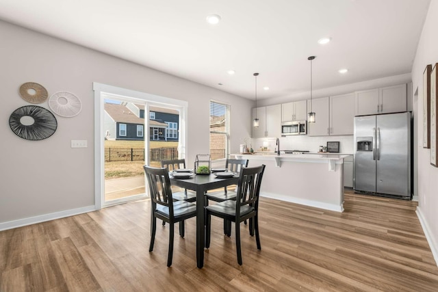 dining room featuring light wood-type flooring