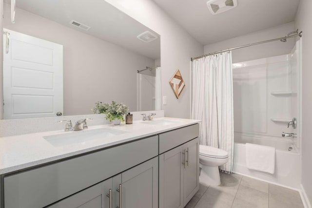 full bathroom featuring tile patterned flooring, vanity, shower / bath combination with curtain, and toilet