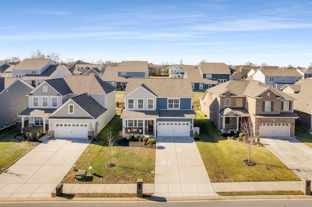 view of front facade featuring a garage and a front lawn