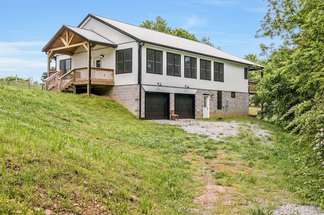 1157 Noah Reeves Rd, Ashland City, TN 37015 - rear view of house with a garage