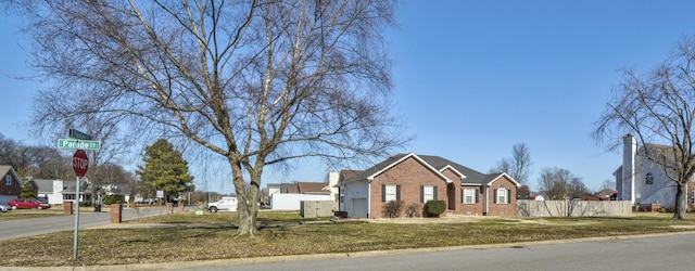 view of front of home with a front yard