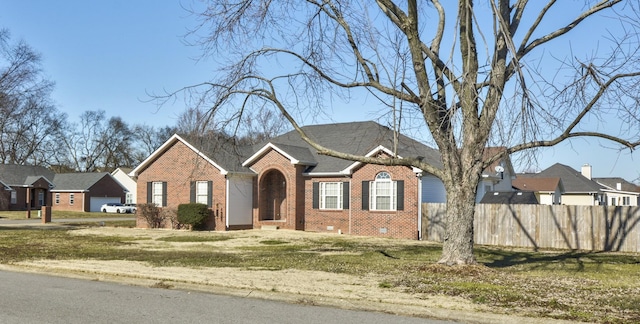 view of front facade with a front yard