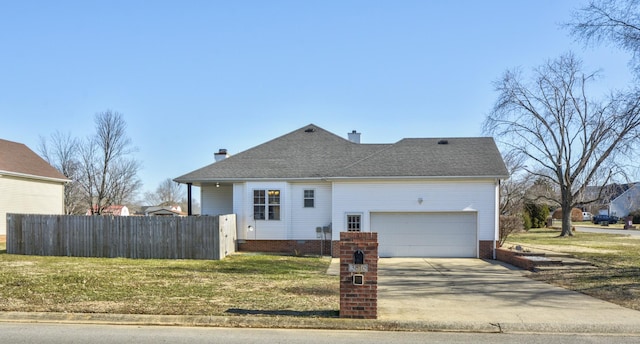 view of front facade featuring a garage and a front lawn