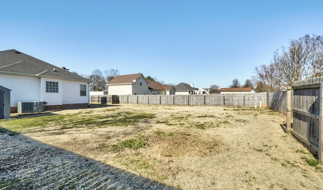 view of yard featuring central AC