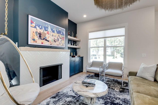 living room with light hardwood / wood-style flooring