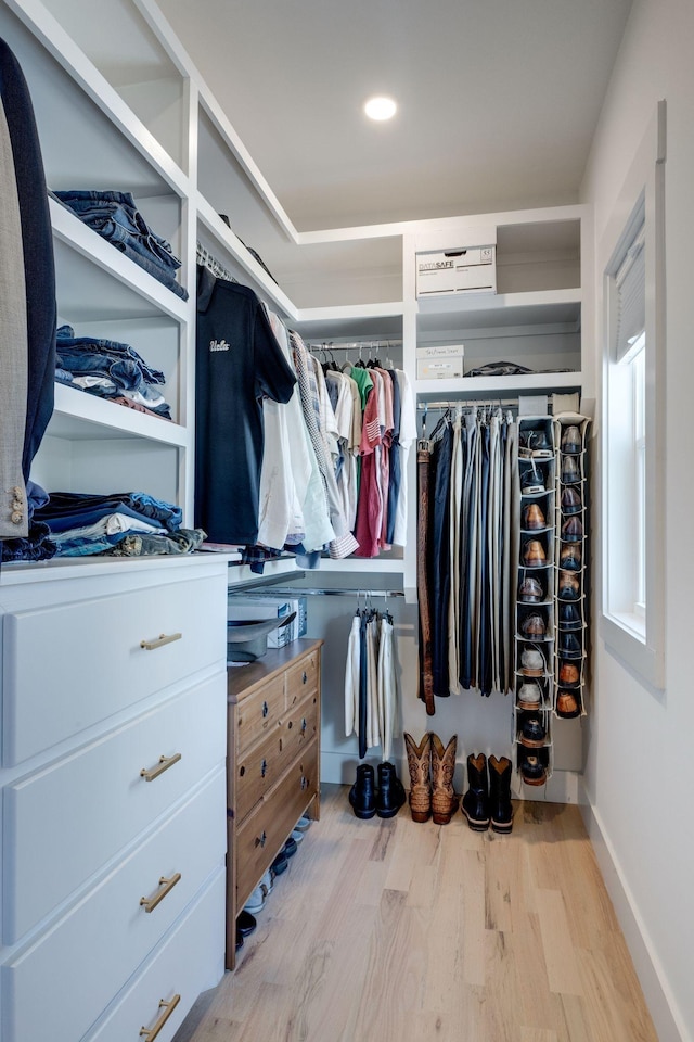 spacious closet featuring light wood-type flooring