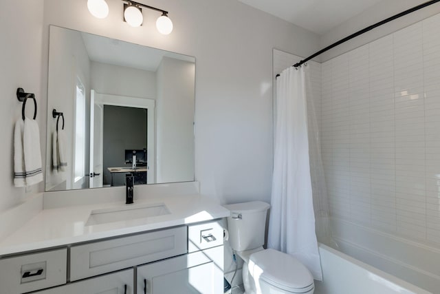 full bathroom with shower / bath combination with curtain, vanity, and toilet