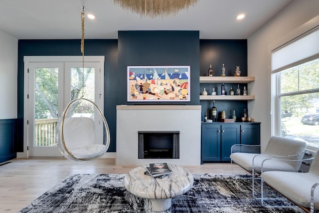 living room with light hardwood / wood-style flooring