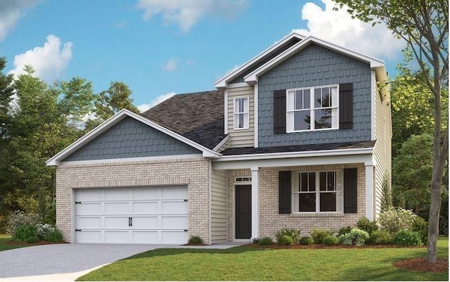 craftsman-style home featuring a garage and a front lawn