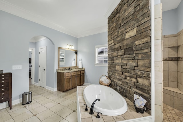 bathroom featuring tile patterned flooring, crown molding, shower with separate bathtub, and vanity