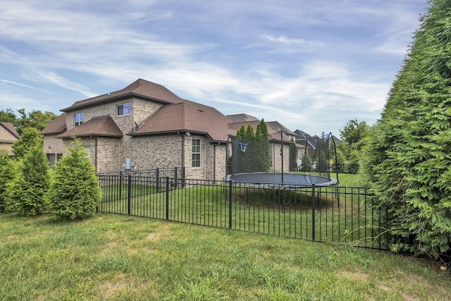 view of yard featuring a trampoline