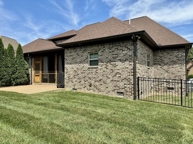 exterior space with a yard and a patio area