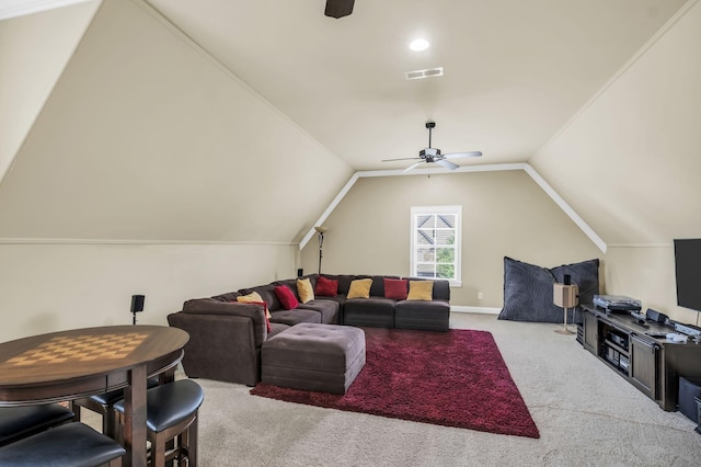 carpeted living room featuring vaulted ceiling and ceiling fan