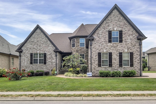 view of front of property with a front yard