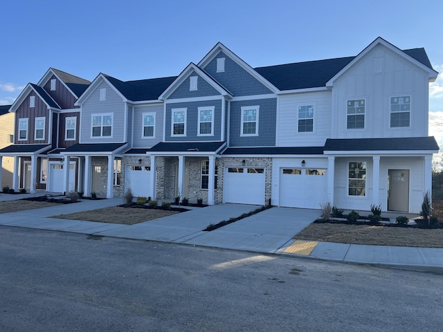 townhome / multi-family property featuring a garage