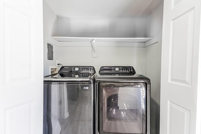 laundry room featuring washing machine and dryer