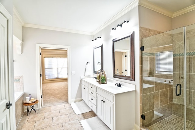 bathroom featuring ornamental molding, a shower with shower door, and vanity