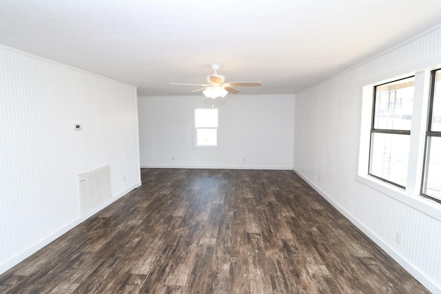 unfurnished room featuring dark hardwood / wood-style flooring and ceiling fan