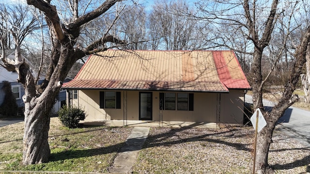 view of front of house with a patio area