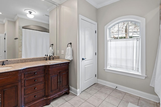 bathroom with vanity, tile patterned flooring, and ornamental molding