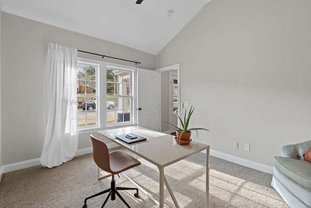 carpeted home office featuring ceiling fan and high vaulted ceiling