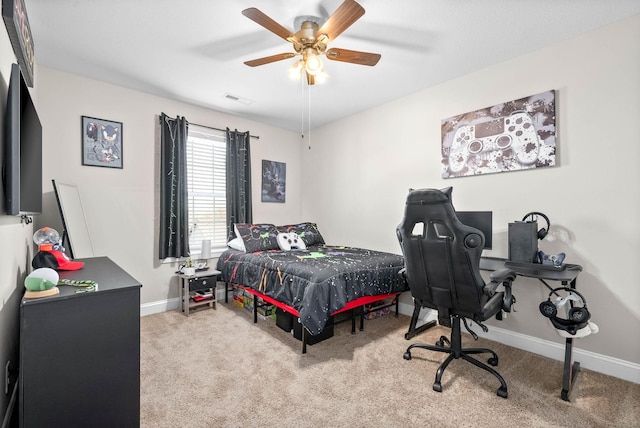 carpeted bedroom with ceiling fan